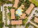 An attractive aerial view of the community pool and residences at 4061 Crockers Lake Blvd # 2618, Sarasota, FL 34238