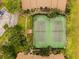 The community featuring tennis courts is surrounded by mature landscaping and buildings at 4061 Crockers Lake Blvd # 2618, Sarasota, FL 34238