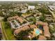 A stunning aerial view featuring residences and community pool at 4061 Crockers Lake Blvd # 2618, Sarasota, FL 34238