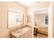 Stylish bathroom features a modern vanity and is conveniently located adjacent to the bedroom at 4061 Crockers Lake Blvd # 2618, Sarasota, FL 34238
