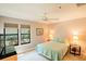 This bright bedroom features light colors, lots of light, and neutral decor at 4061 Crockers Lake Blvd # 2618, Sarasota, FL 34238