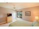 Comfortable bedroom with a view of the outdoors at 4061 Crockers Lake Blvd # 2618, Sarasota, FL 34238