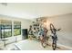 Bonus room featuring lots of storage, tile floors, and bright sunlight at 4061 Crockers Lake Blvd # 2618, Sarasota, FL 34238