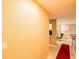 Inviting hallway features tile floors and neutral wall color scheme for a serene welcome at 4061 Crockers Lake Blvd # 2618, Sarasota, FL 34238