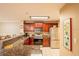Modern kitchen features granite countertops, stainless steel appliances, and a breakfast bar at 4061 Crockers Lake Blvd # 2618, Sarasota, FL 34238