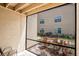 The screened-in lanai has a view of the landscaped grounds at 4061 Crockers Lake Blvd # 2618, Sarasota, FL 34238