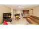 Open concept floor plan joining the living room, dining area, and kitchen at 4061 Crockers Lake Blvd # 2618, Sarasota, FL 34238