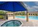 Relaxing spa area near the pool with covered seating at 4061 Crockers Lake Blvd # 2618, Sarasota, FL 34238