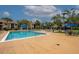 A serene swimming pool surrounded by comfortable lounge chairs at 4061 Crockers Lake Blvd # 2618, Sarasota, FL 34238