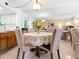 Charming dining area with elegant decor, adjacent to the kitchen and living spaces at 4355 Longmeadow # 23, Sarasota, FL 34235