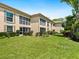 Beautiful exterior of home with screen lanai overlooking the yard at 4355 Longmeadow # 23, Sarasota, FL 34235