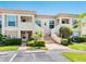Inviting two-story condo with well-maintained landscaping and convenient parking at 4355 Longmeadow # 23, Sarasota, FL 34235