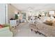 Bright living room with plush seating, stylish decor, and open floor plan perfect for entertaining guests at 4355 Longmeadow # 23, Sarasota, FL 34235