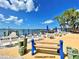 Beautiful community dock with ample seating, picnic tables, and stunning waterfront views, perfect for relaxation and socializing at 4408 125Th W St, Cortez, FL 34215