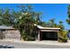 Charming single-story home with wood siding, mature landscaping and convenient covered parking area at 4408 125Th W St, Cortez, FL 34215