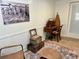 Relaxing sitting area featuring comfortable wicker seating, artwork, and vintage accents at 4408 125Th W St, Cortez, FL 34215