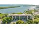 Multi-story waterfront condo building overlooking scenic water views at 4500 Gulf Of Mexico Dr # Ph4, Longboat Key, FL 34228