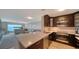 Modern kitchen with granite island and stainless appliances, perfect for entertaining at 4500 Gulf Of Mexico Dr # Ph4, Longboat Key, FL 34228