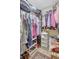 Walk-in closet with shelving and hanging rods for optimal storage solutions at 4722 Oak Hill Ln # 44, Sarasota, FL 34232