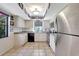 Bright kitchen featuring stainless steel appliances and ample counter space at 4722 Oak Hill Ln # 44, Sarasota, FL 34232
