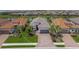 Beautiful home in a waterfront community, featuring lush lawns and picturesque water views at 4726 Zeno Ct, Bradenton, FL 34211