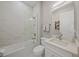 Bathroom featuring a marble tiled shower, toilet, vanity, and mirror at 4726 Zeno Ct, Bradenton, FL 34211
