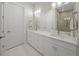 Bathroom with double vanity, quartz countertops, and modern fixtures at 4726 Zeno Ct, Bradenton, FL 34211