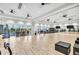 Large, well-equipped gym with modern exercise equipment, ceiling fans and ample natural light at 4726 Zeno Ct, Bradenton, FL 34211