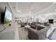 Spacious living room features modern decor, recessed lighting, and seamless flow to the kitchen at 4726 Zeno Ct, Bradenton, FL 34211
