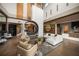Lobby area featuring a fireplace, comfortable seating, and elegant decor at 4726 Zeno Ct, Bradenton, FL 34211