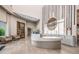 Bright lobby features a high ceiling, stylish tiled flooring, a front desk and comfortable seating at 4726 Zeno Ct, Bradenton, FL 34211