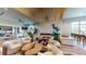 Spacious lounge featuring plush seating, a modern fireplace, and stylish decor at 4726 Zeno Ct, Bradenton, FL 34211
