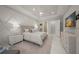 Bright main bedroom with tray ceiling, custom accent wall, and neutral color palette at 4726 Zeno Ct, Bradenton, FL 34211