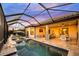 Covered patio with outdoor dining and seating, overlooking the screened-in pool at 4726 Zeno Ct, Bradenton, FL 34211