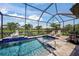 Screened-in pool with a water feature, poolside seating, and a view of the lake at 4726 Zeno Ct, Bradenton, FL 34211