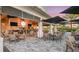 Outdoor patio area with ample seating and a fully stocked bar at 4726 Zeno Ct, Bradenton, FL 34211