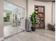 Relaxing spa featuring modern tiled floors, glass doors, a decorative cabinet and a potted plant at 4726 Zeno Ct, Bradenton, FL 34211