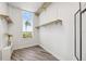 Bright walk-in closet with built-in shelving and storage, offering plenty of space and organization at 516 Tamiami S Trl # 102, Nokomis, FL 34275