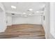 Open flex room featuring modern flooring and neutral walls, ready for customization at 516 Tamiami S Trl # 102, Nokomis, FL 34275