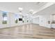 Large flex room featuring modern flooring, natural light, and a clean, open layout at 516 Tamiami S Trl # 102, Nokomis, FL 34275