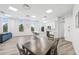 Bright, open-concept living space connecting a modern kitchen, dining area, and comfortable seating at 516 Tamiami S Trl # 102, Nokomis, FL 34275