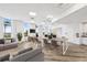 Bright work room with hardwood floors, lots of natural light, and plenty of space for working at 516 Tamiami S Trl # 102, Nokomis, FL 34275