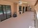 A covered back patio features multiple ceiling fans, ample room, and access to the pool at 5340 Dominica Cir, Sarasota, FL 34233