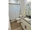 Modern bathroom features a sleek vanity, stylish fixtures, and a shower with elegant tile work at 5473 Gagnon Ter, North Port, FL 34291