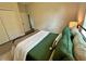Comfortable bedroom features natural light, soft bedding, and ample closet space at 5473 Gagnon Ter, North Port, FL 34291