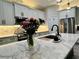 Stunning kitchen with a large island, elegant countertops, modern appliances, and bright lighting, perfect for cooking and gatherings at 5473 Gagnon Ter, North Port, FL 34291