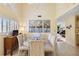 Bright dining room featuring natural light and neutral decor at 5624 Ashton Lake Dr # 5624, Sarasota, FL 34231