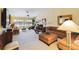 Spacious living room with vaulted ceilings and neutral colored furniture at 5624 Ashton Lake Dr # 5624, Sarasota, FL 34231
