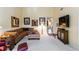 Living room with high ceilings, neutral decor, and TV at 5624 Ashton Lake Dr # 5624, Sarasota, FL 34231