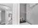 This is the laundry area featuring a washer and a shelf at 5691 Bentgrass Dr # 15-101, Sarasota, FL 34235